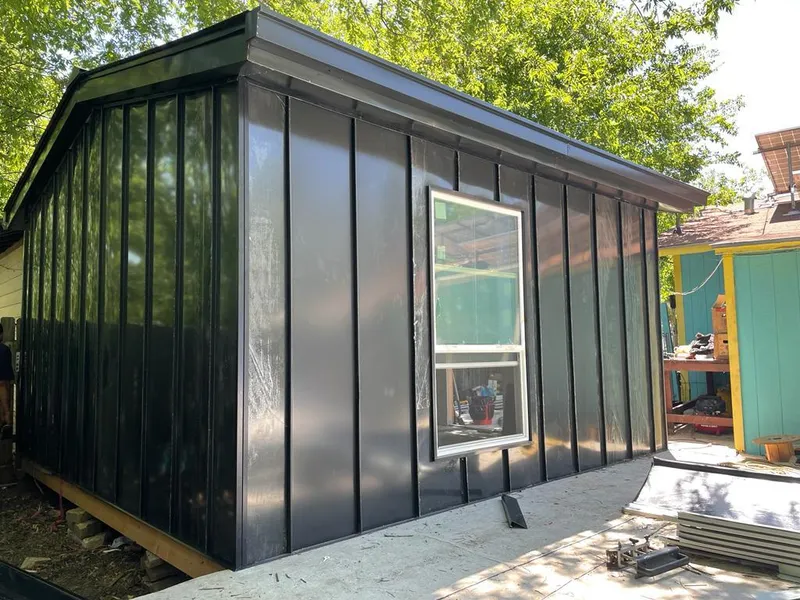 Black standing seam metal wall panels for Metal Roof Installation in South Hanover