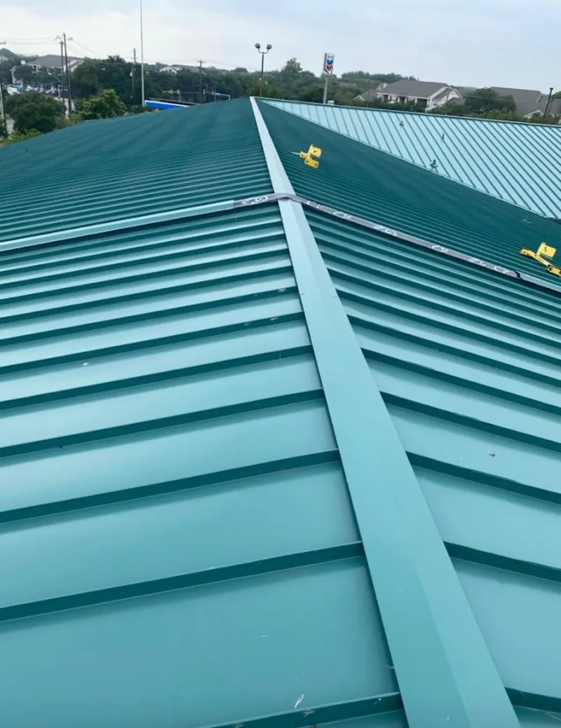 Green commercial metal roof ridge and valley for Metal Roof Repair in South Hanover